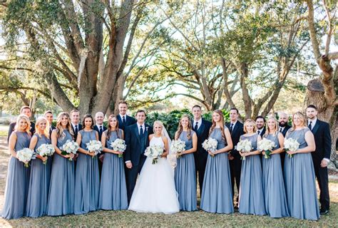 blue groomsmen suits with bridesmaids.